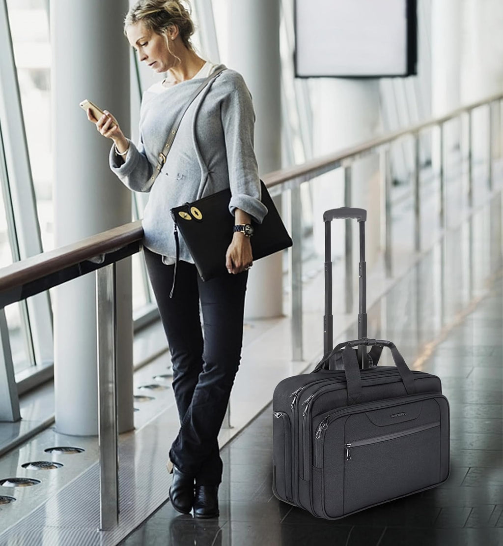 Black rolling laptop briefcase held by the top handle with telescoping base