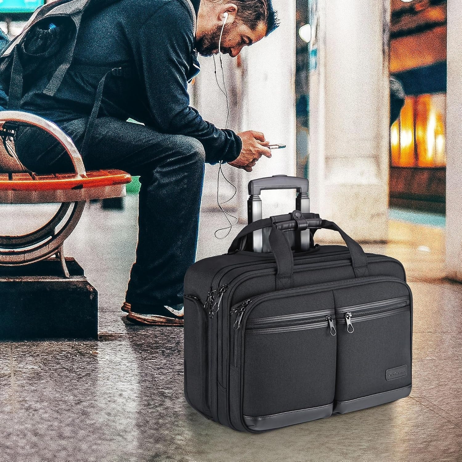 Dark rolling business briefcase with telescoping handle and wheels for work travel