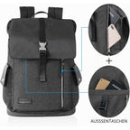 Gray laptop backpack with front flap, vertical zipper, and expandable side pockets.