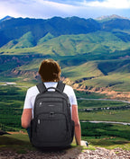 KROSER laptop backpack worn on a person, dark gray with front zip compartments.
